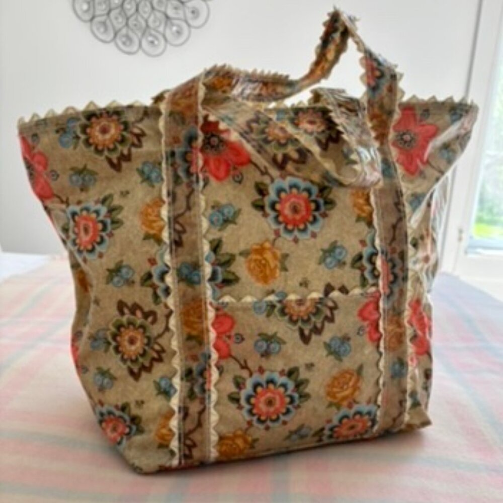 Plasticized fabric floral tote bag